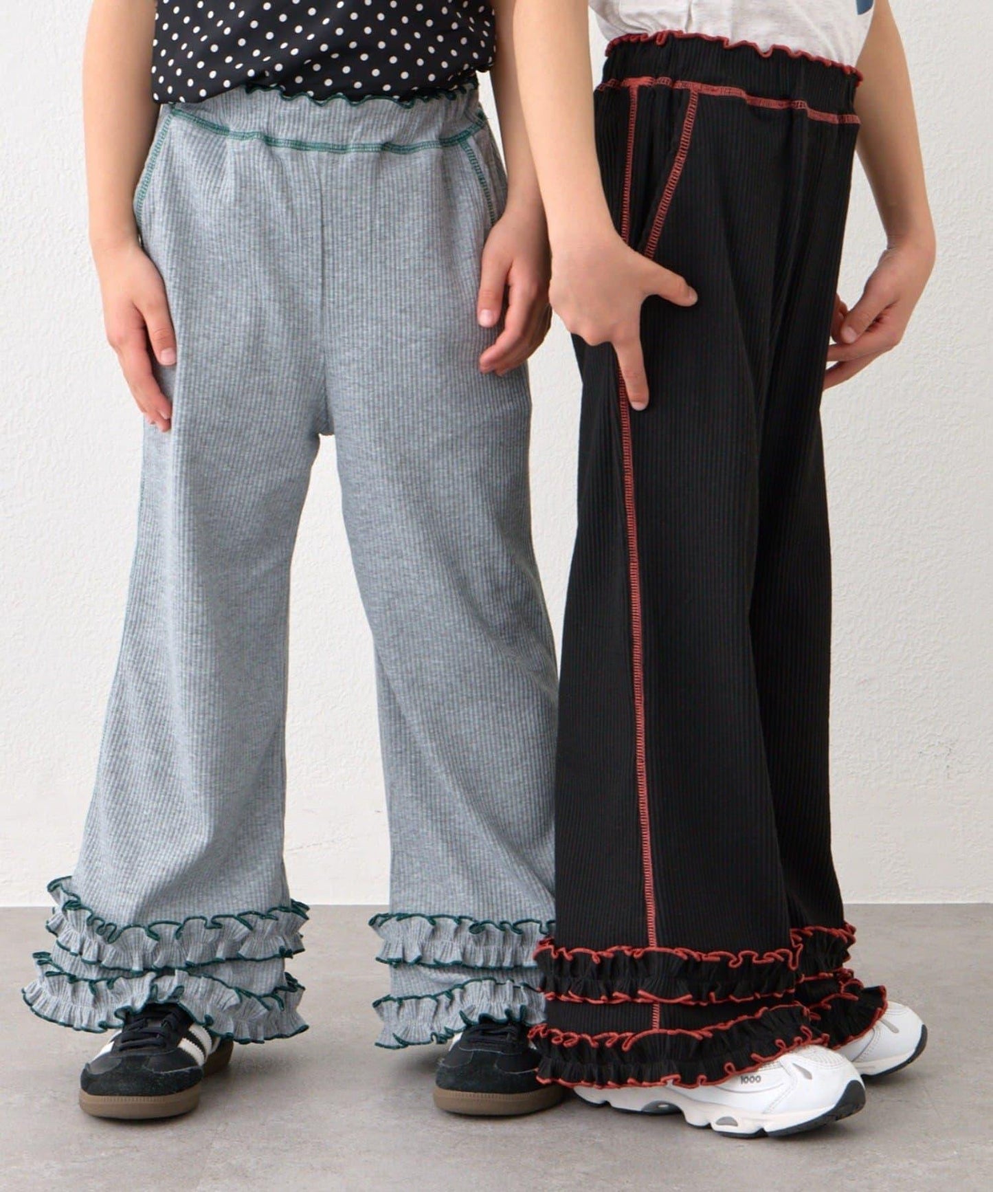 褲腳荷葉邊撞色走線微喇羅紋褲子