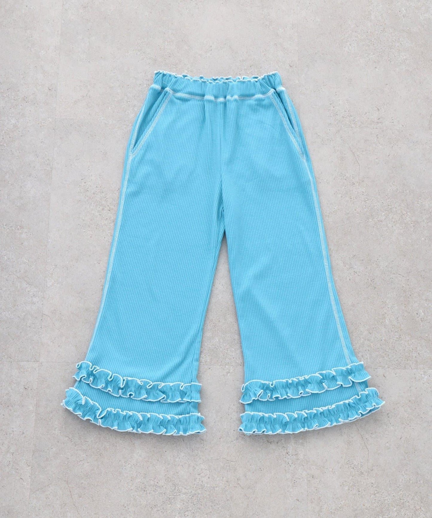 褲腳荷葉邊撞色走線微喇羅紋褲子