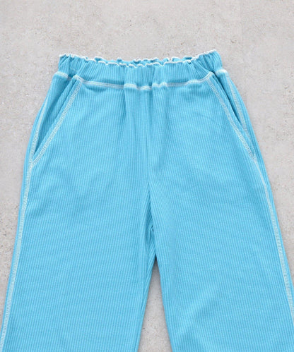 褲腳荷葉邊撞色走線微喇羅紋褲子