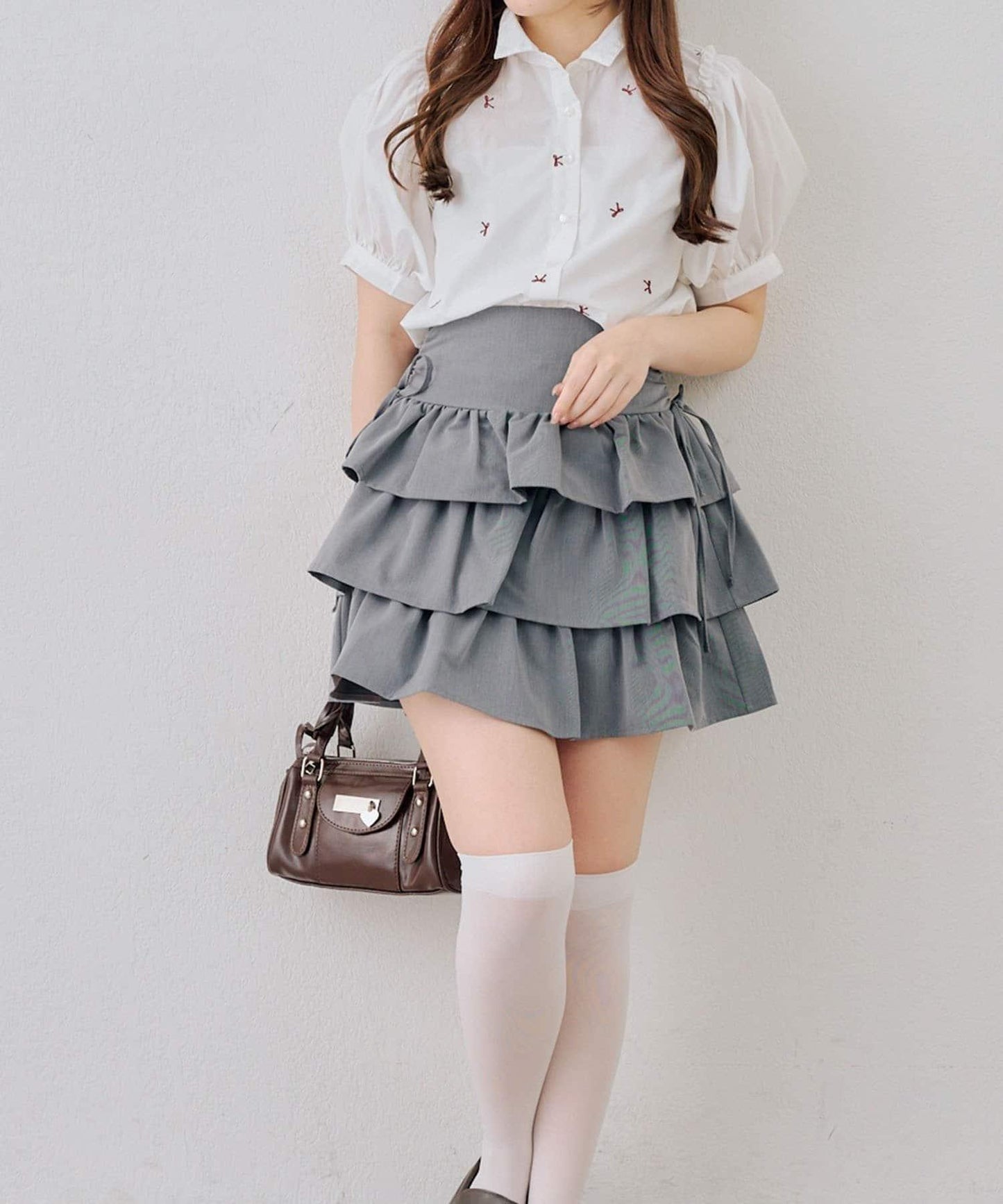 側邊蝴蝶結層疊迷你半身裙